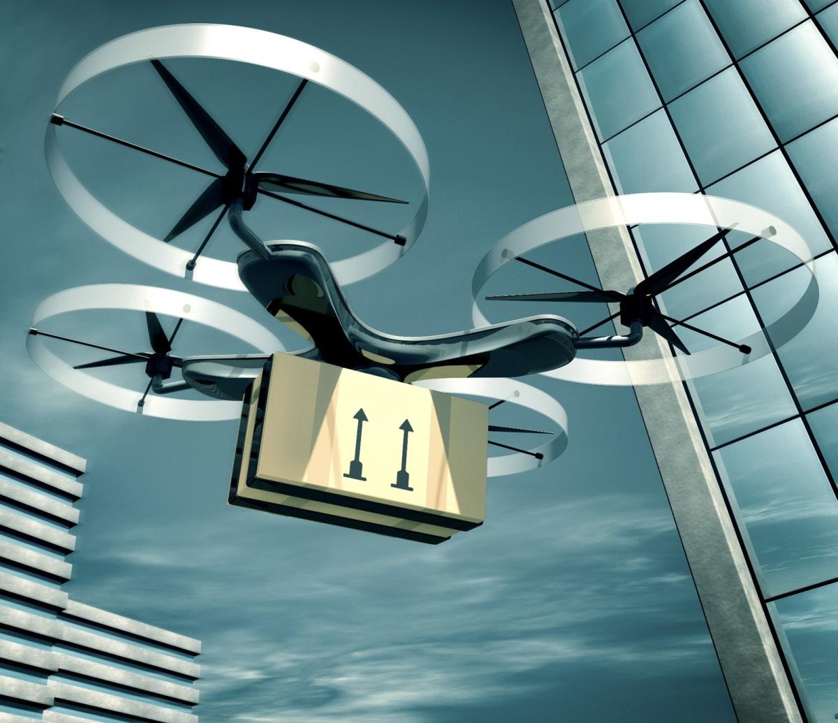 Drone flying with package