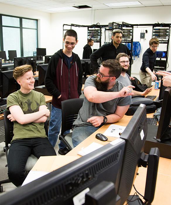 Group of students in computer technology classroom at SPSCC.